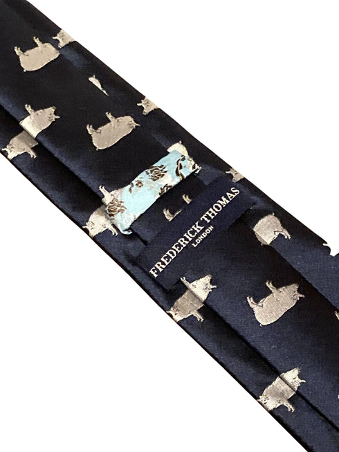 navy blue tie with pig silhouette embroidered design